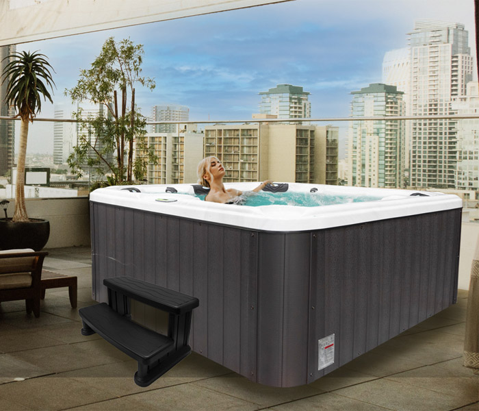 Hot Tubs, Spas, Portable Spas, for sale Geo Spas GEO Spas hot tub being used in a family setting